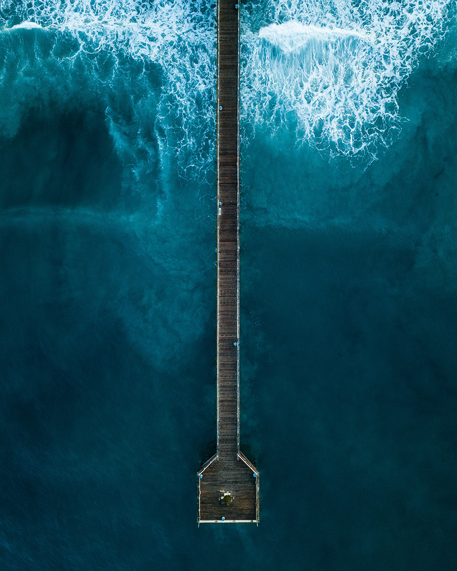 How to Fly a Drone – An overhead shot of a jetty